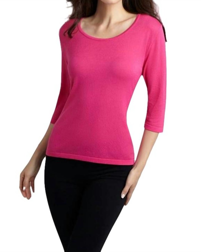 Front of a model wearing a size XL Three Quarter Sleeve Tunic Top in Fuchsia in Fuchsia by ANGEL. | dia_product_style_image_id:327000
